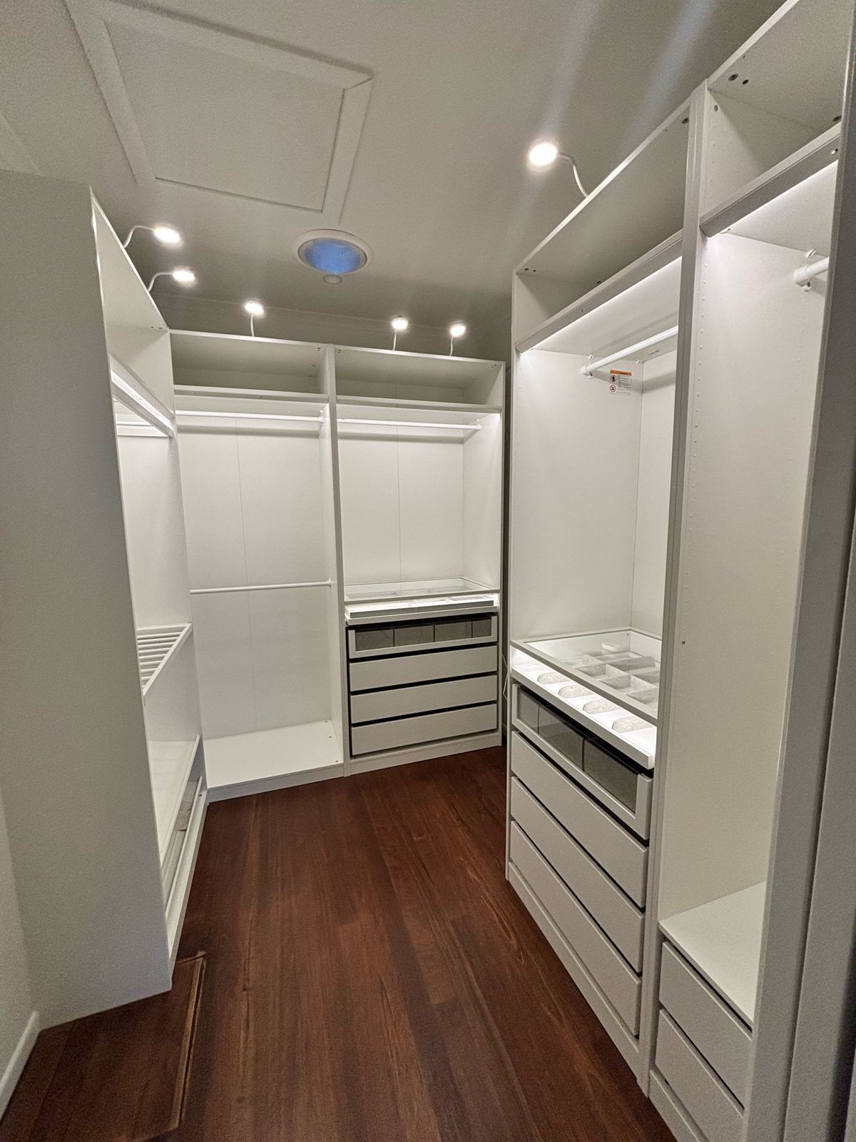 IKEA PAX walk-in wardrobe with lighting