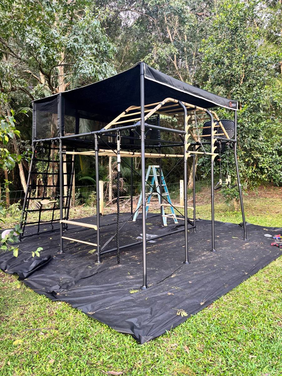 Vuly play centre assembled and installed in a backyard